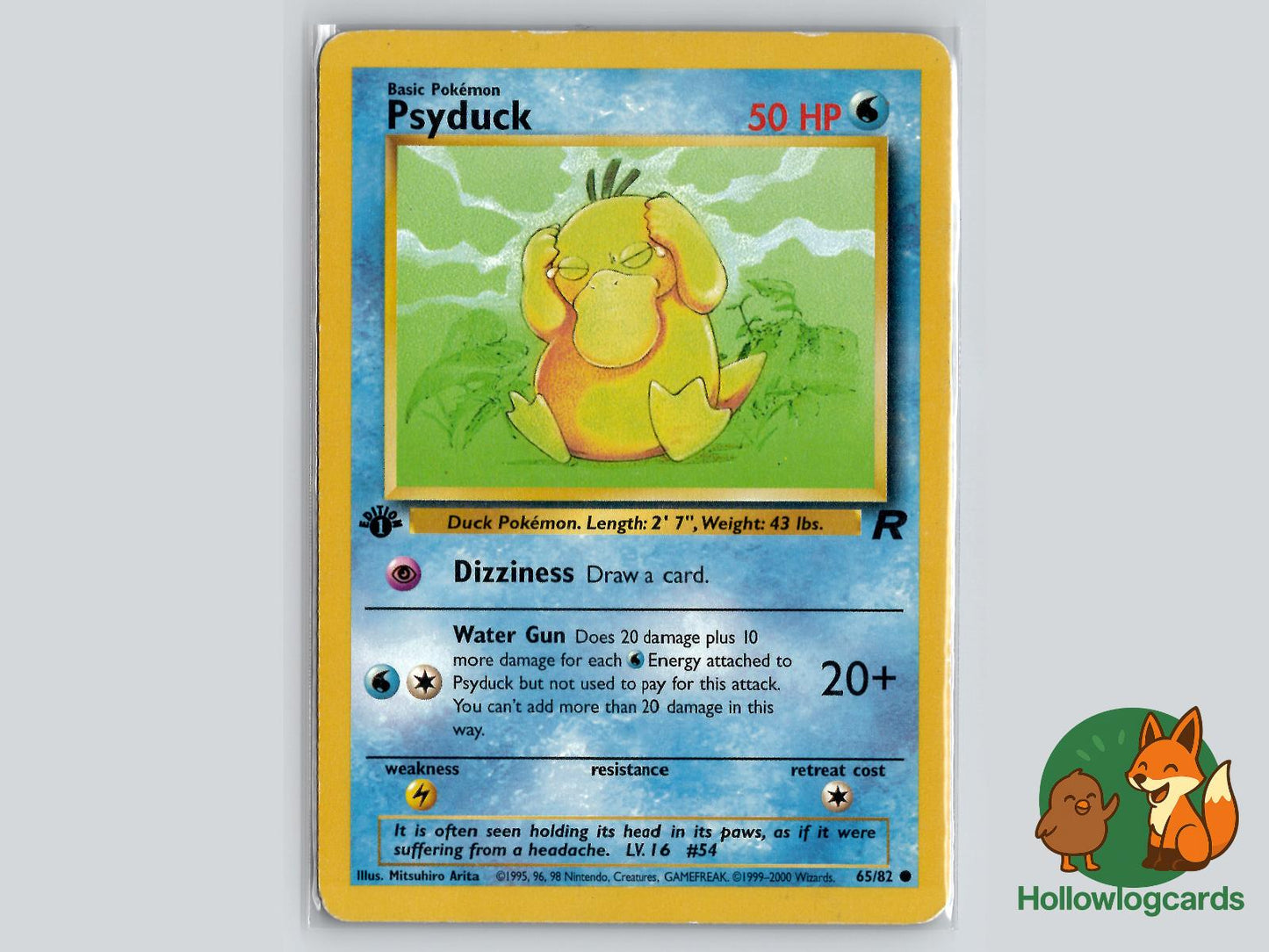1st Edition Psyduck (65/82) - Team Rocket Pokémon Card